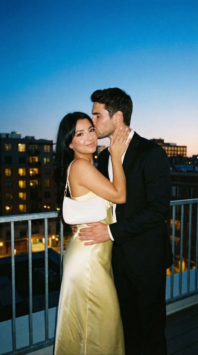 Preview image for Candid Rooftop Kiss with Direct Flash at Blue Hour prompt