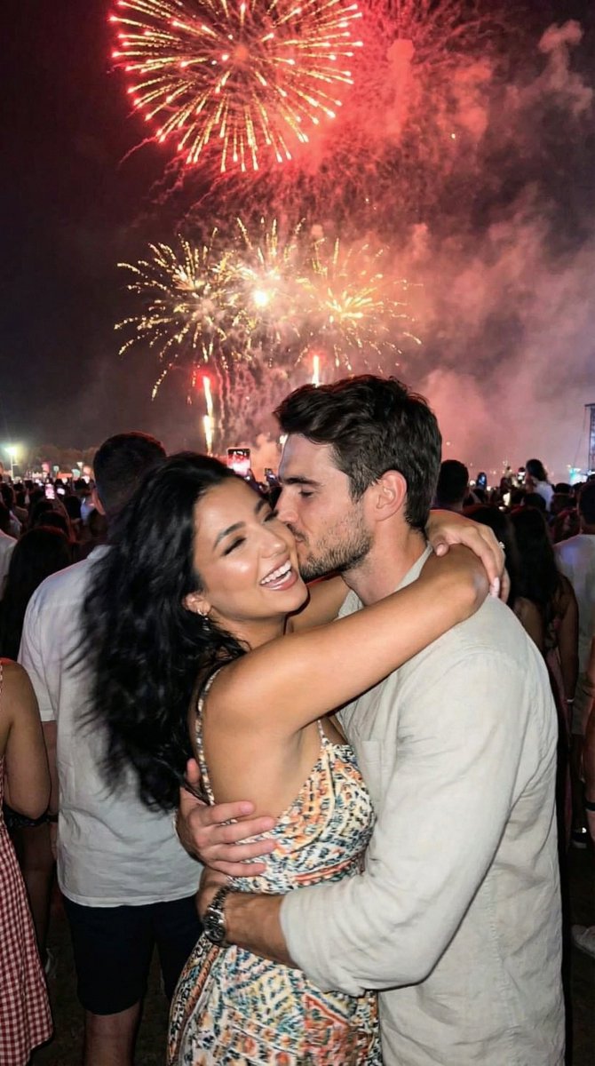 Preview image for Candid Smartphone Snapshot of Festival Kiss with Fireworks prompt