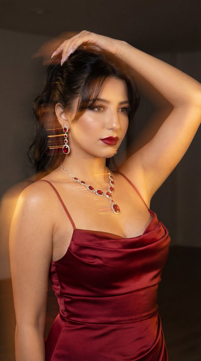 Preview image for Cinematic Fashion Portrait in Deep Red Satin prompt