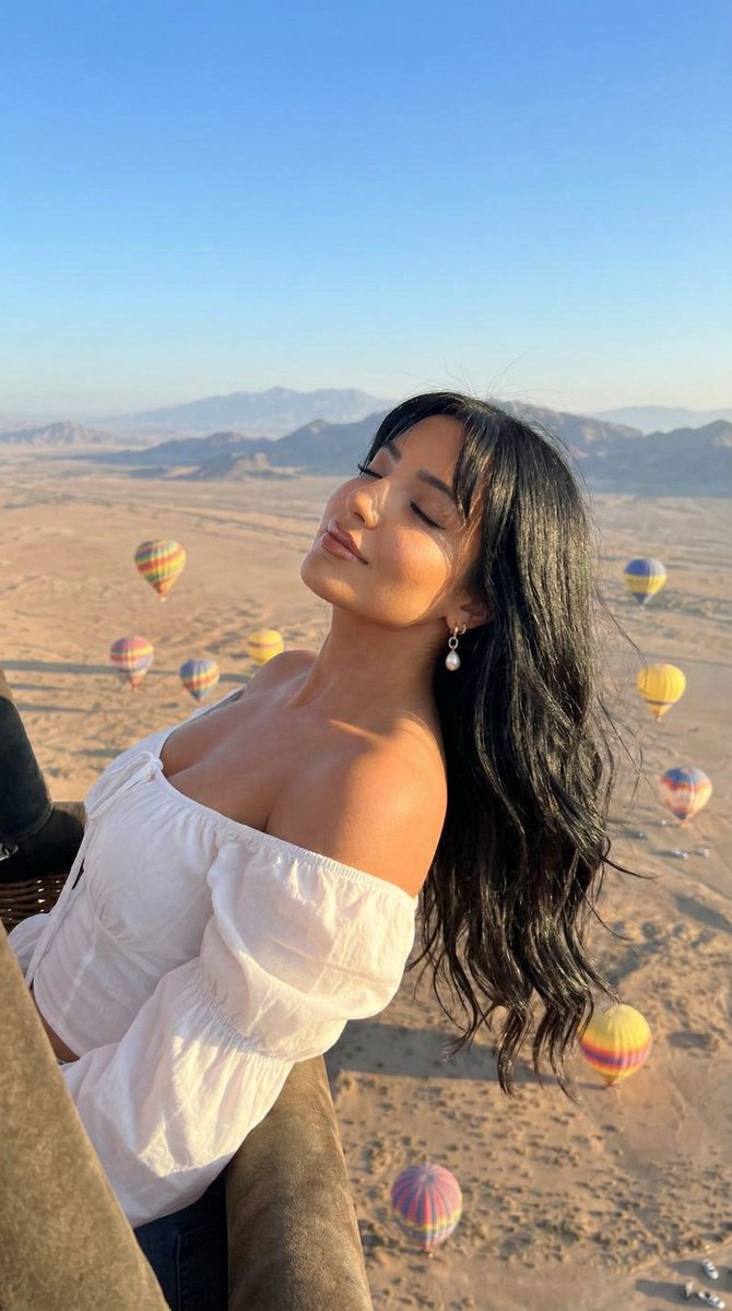 Cinematic Portrait of a Woman in a Hot Air Balloon over a Desert