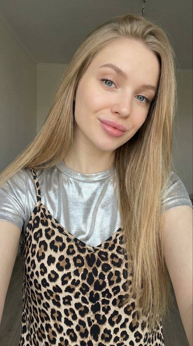 Close-up Selfie of a Young Woman with Leopard Print Top - AI Generated Realistic Style Image Example