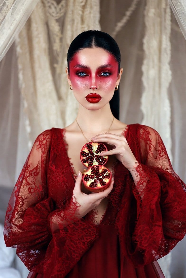 Dramatic Ethereal Portrait of a Woman Holding Pomegranates (Persephone Aesthetic) - AI Generated Character Style Image Example