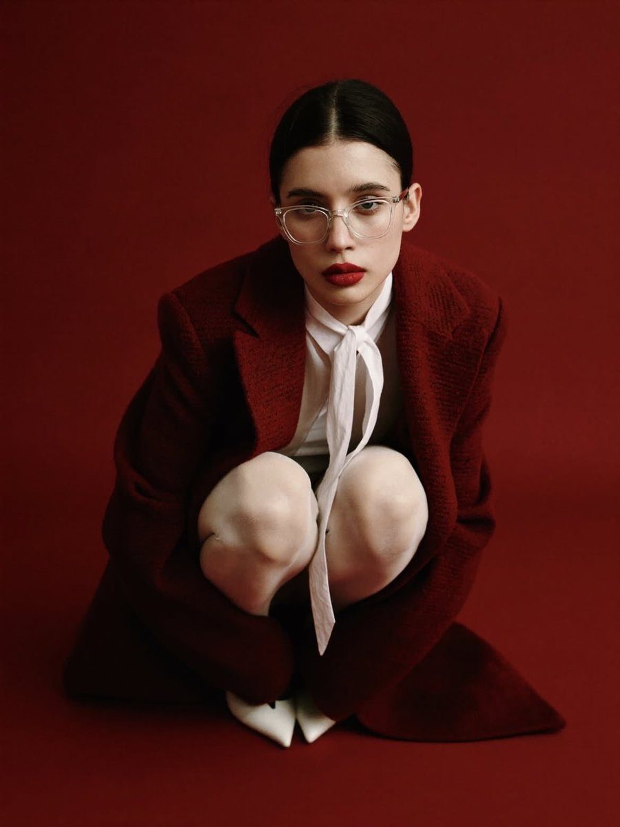 Preview image for High-Fashion Editorial Portrait with Red Background prompt