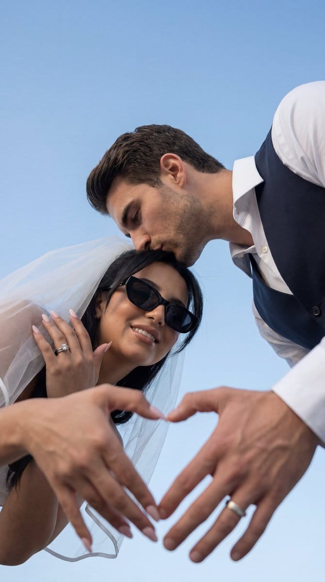 Low-Angle Wedding Editorial with Heart Hands - AI 프롬프트