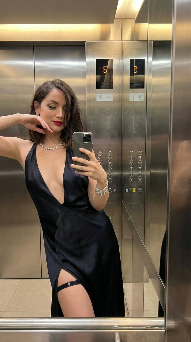 Preview image for Luxury Elevator Mirror Selfie in Deep V-Neck Dress prompt
